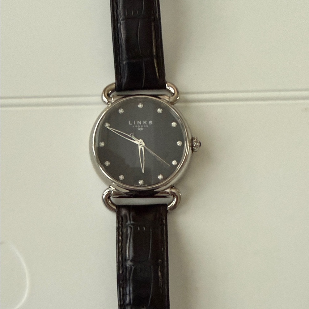 Links of London iconic watch with black face and  diamonds
